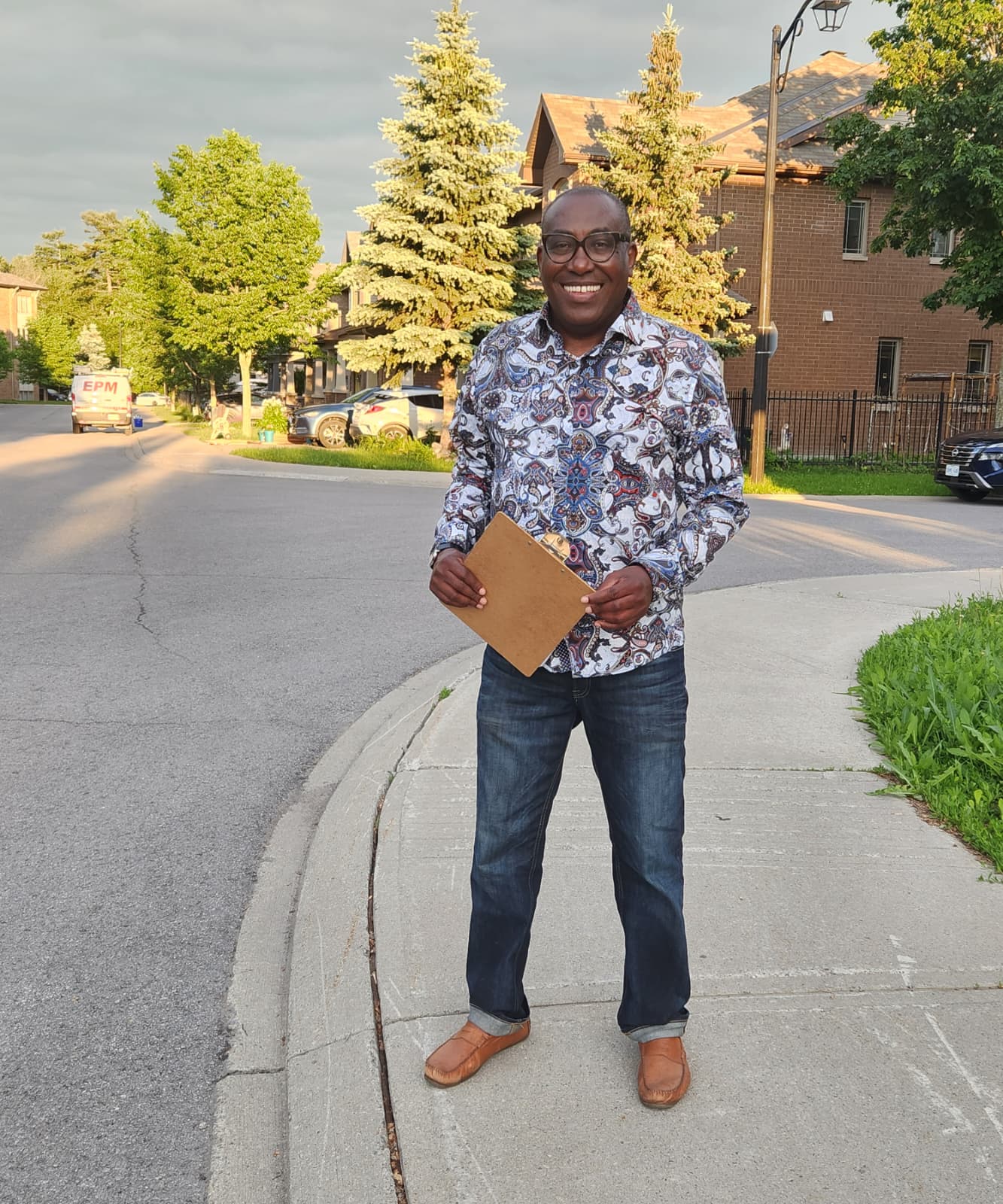 Jules Ruhinda canvassing in a Barrhaven East neighbourhood